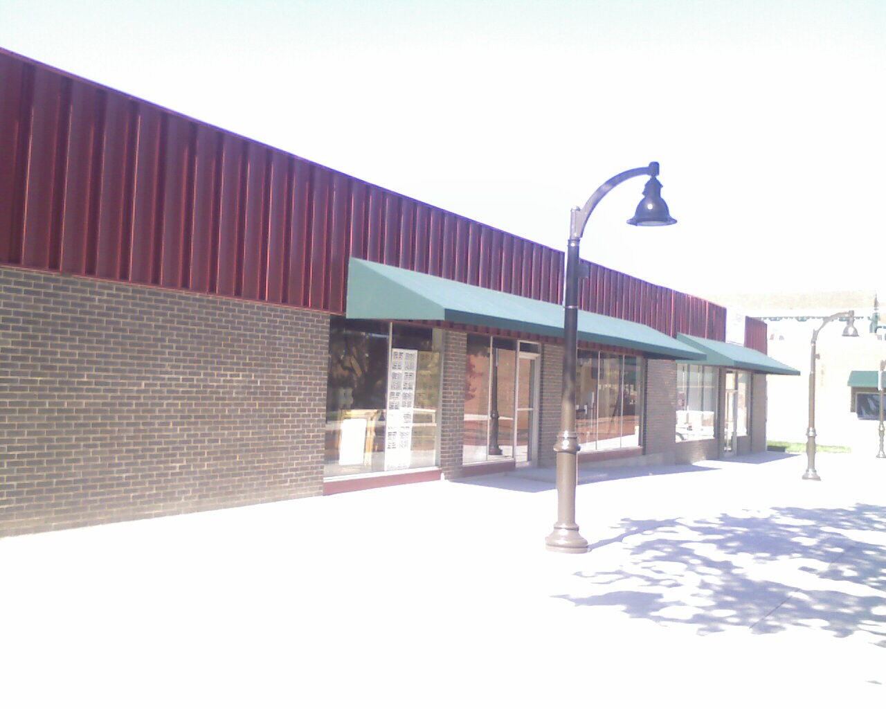 409-413 Commercial St, Atchison, KS for lease Building Photo- Image 1 of 5