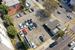 Corner Parking Lot with Billboard & Income - Parking Garage