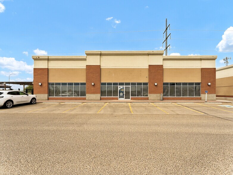 2410 Division Ave NW, Medicine Hat, AB à vendre - Photo du bâtiment - Image 3 de 3