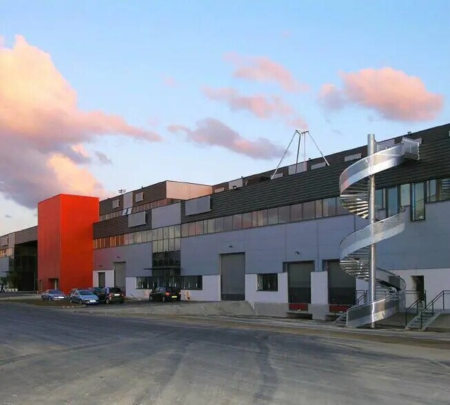 Flex dans Saint-Denis à louer - Photo du bâtiment - Image 1 de 11
