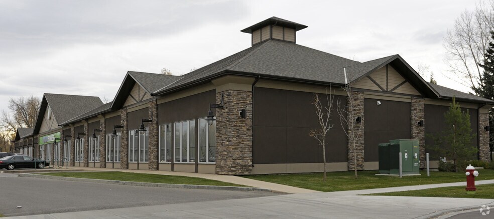 40 Riverside Way, Okotoks, AB à vendre - Photo du bâtiment - Image 2 de 8