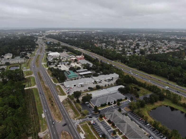 2465 Saint Johns Bluff Rd S, Jacksonville, FL à vendre - Photo du bâtiment - Image 2 de 8