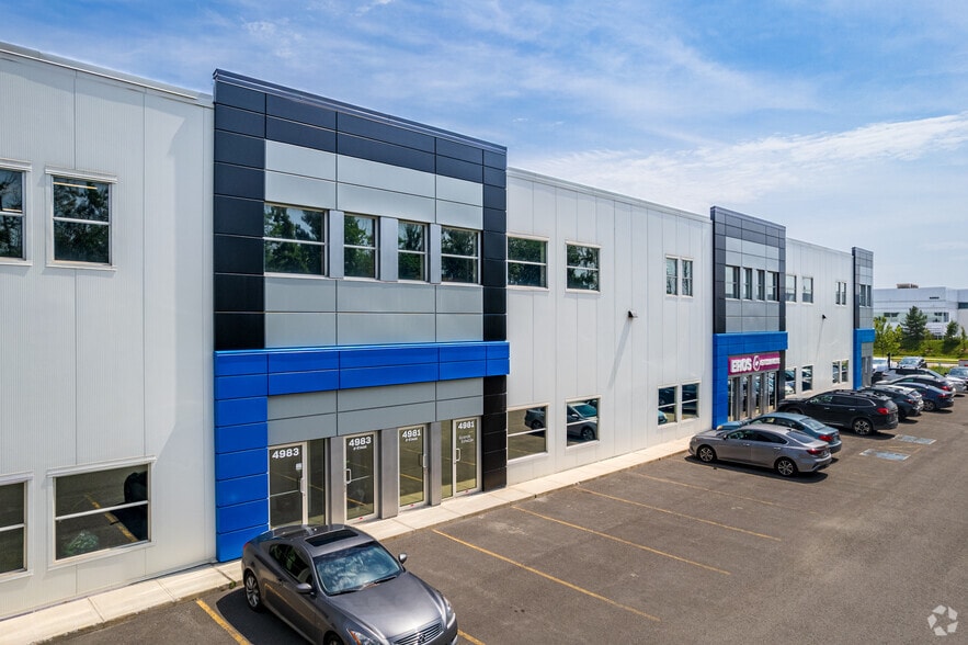 4975-5013 Rue Louis-B.-Mayer, Laval, QC à louer - Photo du bâtiment - Image 3 de 7
