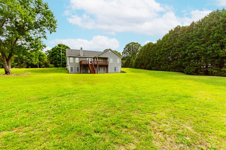 1042 Harbins Rd, Dacula, GA à vendre - Photo du bâtiment - Image 3 de 9