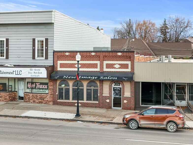 309 N Mitchell St, Cadillac, MI for sale - Building Photo - Image 2 of 33
