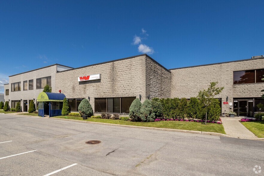 330-364 Rue Joseph-Carrier, Vaudreuil-dorion, QC à louer - Photo du bâtiment - Image 2 de 9