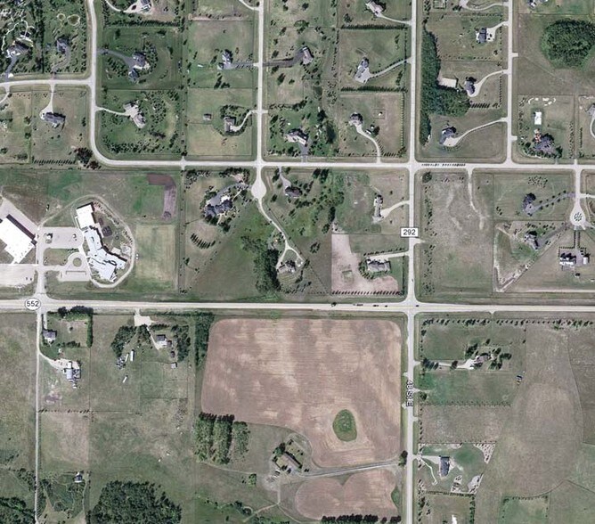 258242 48 St E, De Winton, AB à vendre - Photo principale - Image 1 de 1