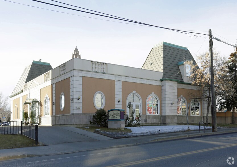 139 17th Ave SW, Calgary, AB à vendre - Photo principale - Image 1 de 1