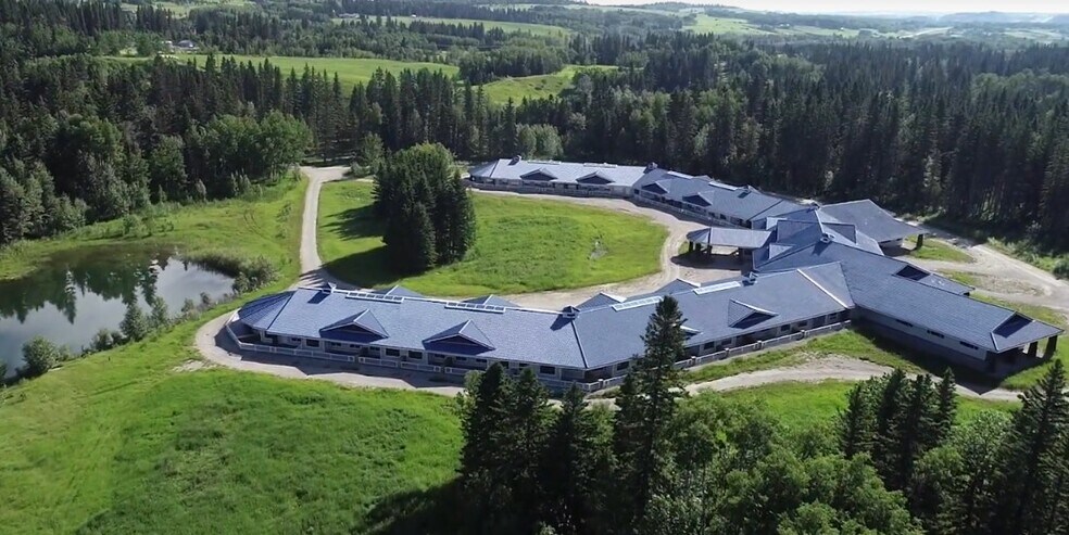 256195 Priddis Greens dr, Foothills, AB à vendre - Photo du bâtiment - Image 2 de 4