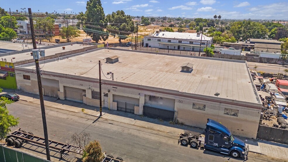 150-154 E 58th St, Los Angeles, CA for sale - Building Photo - Image 1 of 10