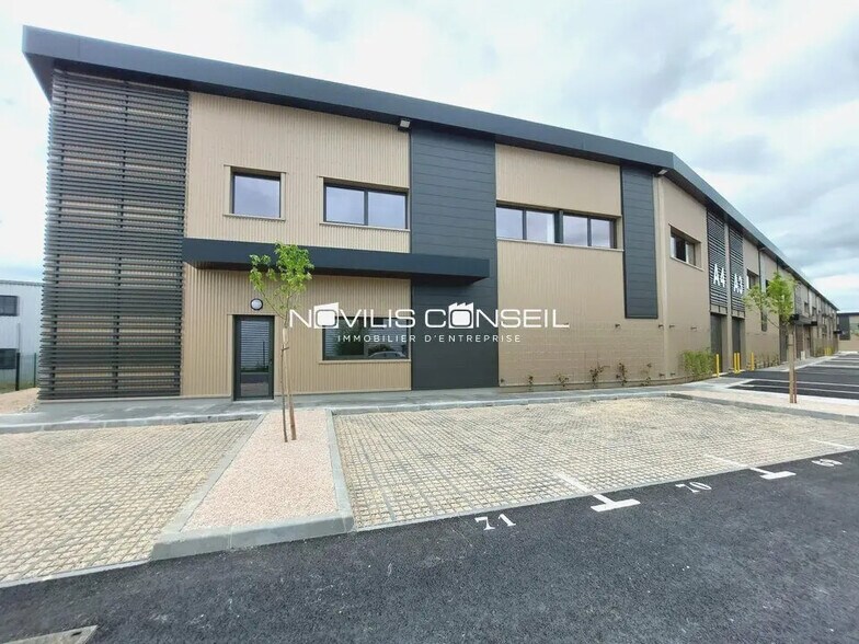 Flex in Launaguet for lease - Building Photo - Image 1 of 9