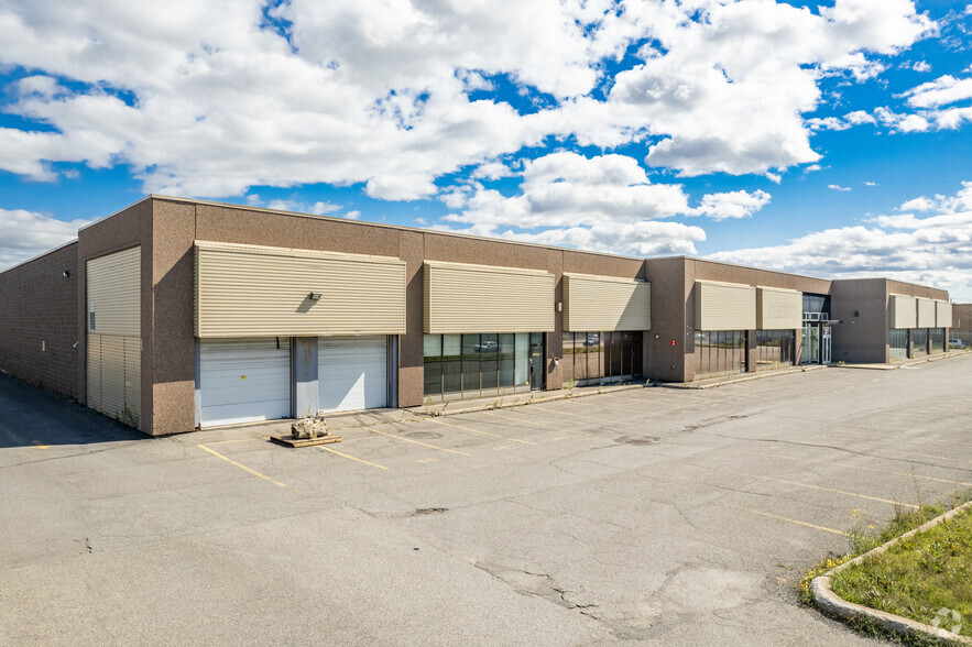 2597-2635 Boul Le Corbusier, Laval, QC for lease - Primary Photo - Image 1 of 11