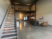 Unit D Family Facilities Seating, Staircase, Kitchen Loft