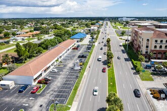 311 Del Prado Blvd, Cape Coral, FL - AERIAL  map view - Image1