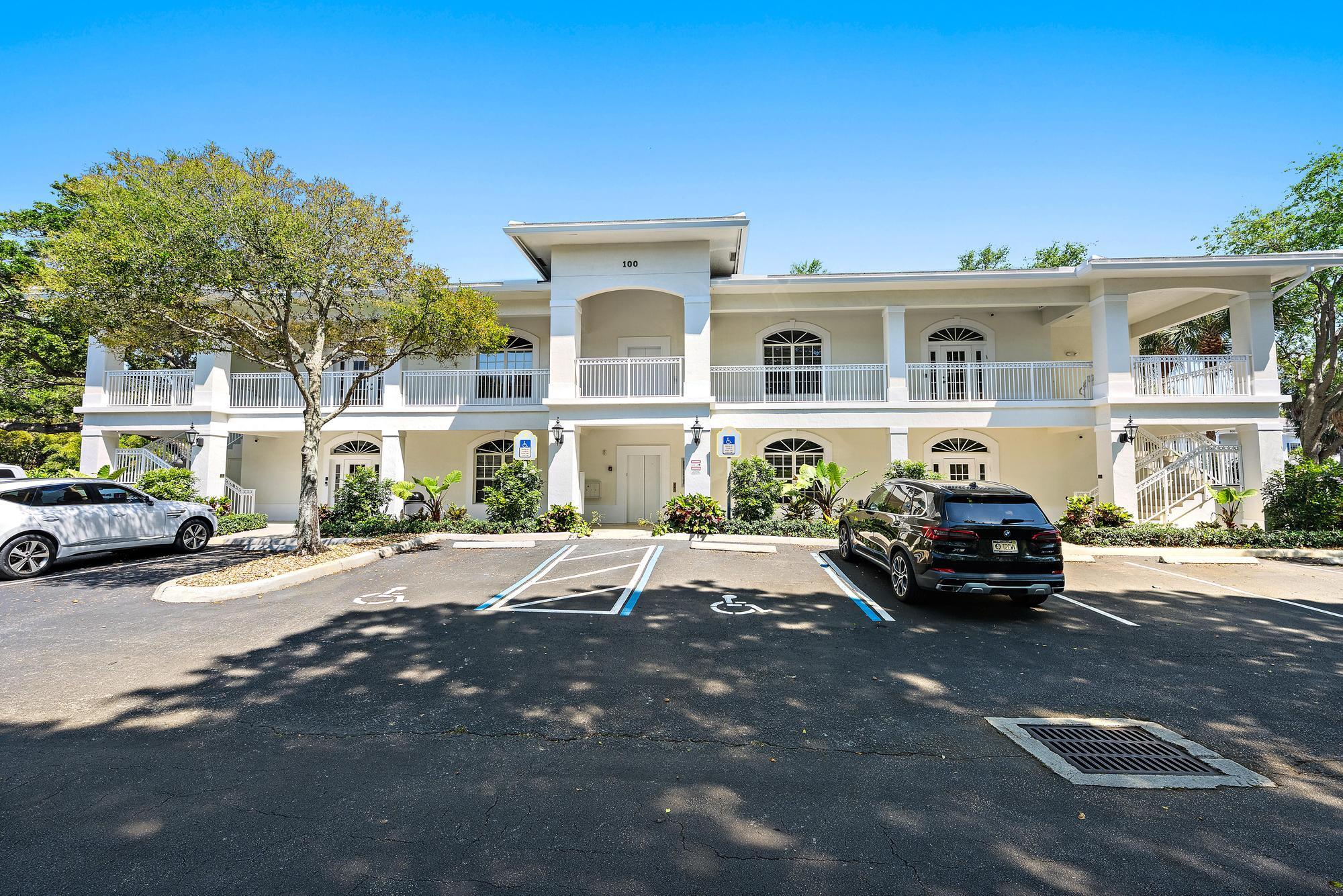 100 Village Square Crossings, Palm Beach Gardens, FL for lease Building Photo- Image 1 of 8