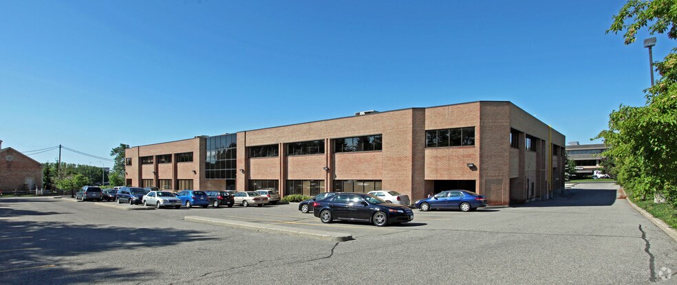 55 Renfrew Dr, Markham, ON à vendre - Photo du bâtiment - Image 2 de 16